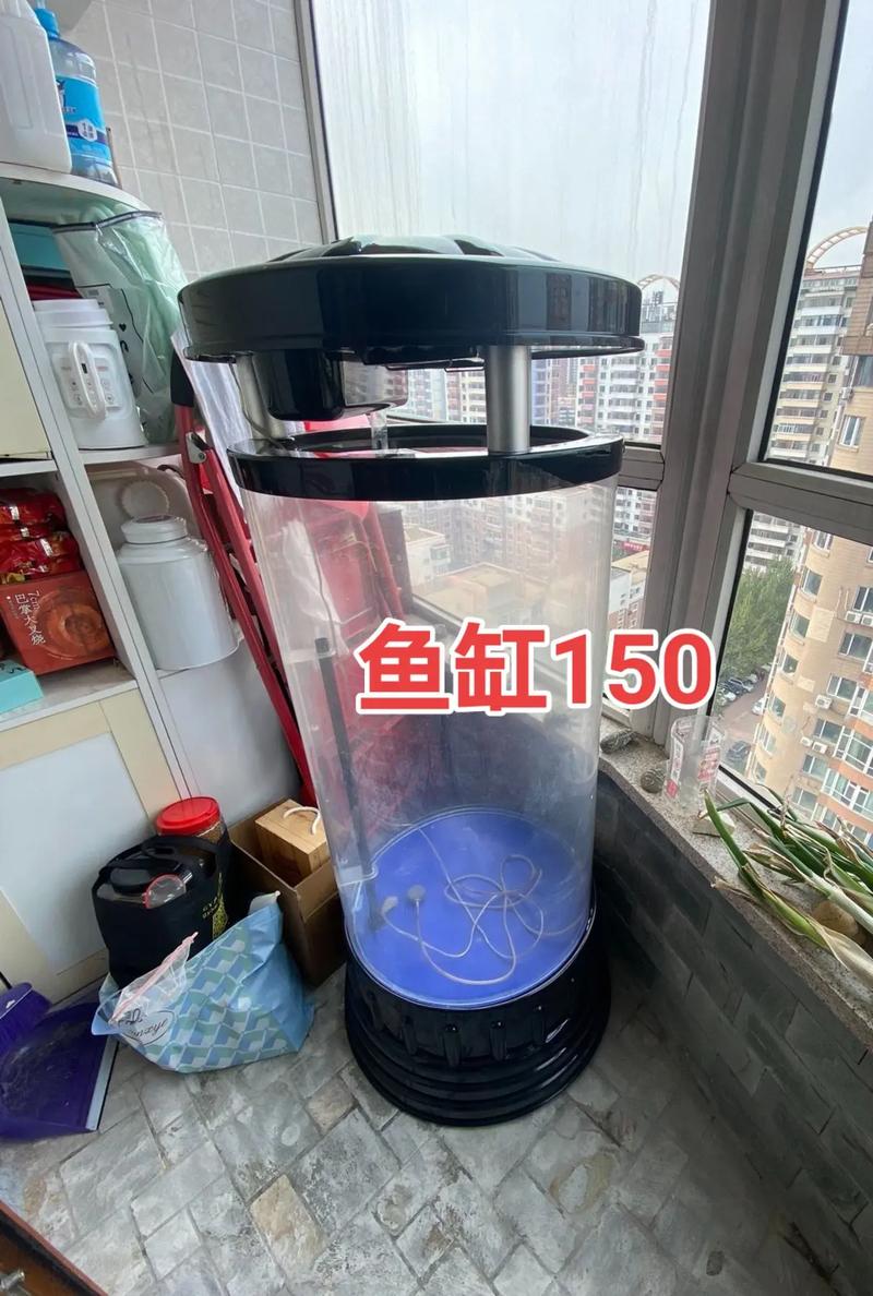 自用圆柱鱼缸,九五新,亚克力的,缸内配件齐全,闲置用不到了不